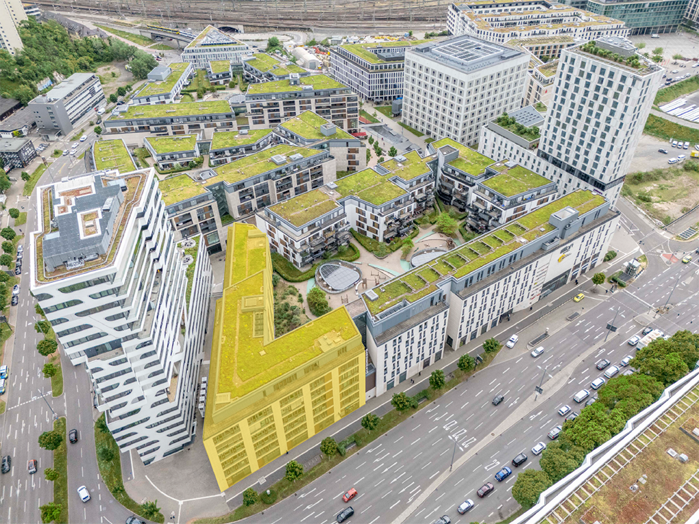 Drohnenaufnahme des Milaneo Office Stuttgart, markiertes Bürogebäude im Europaviertel neben Wohn- und Gewerbeimmobilien.